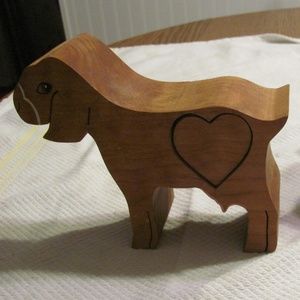 wooden goat with small pull out storage